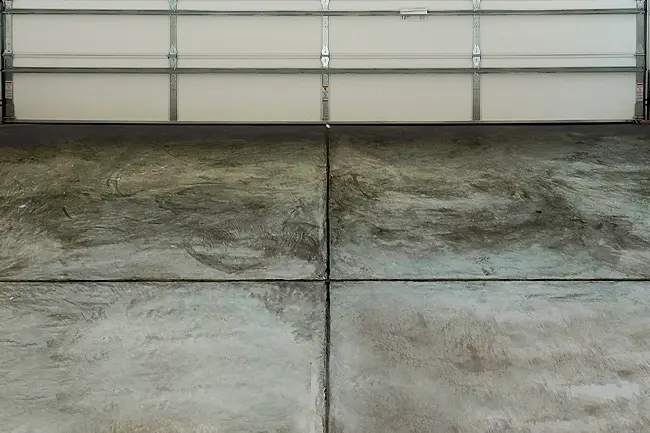 Garage-Floor-Cleaning-BEFORE-ic-webp